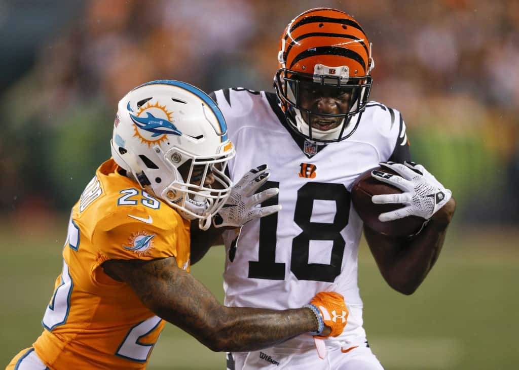 Cincinnati Bengals wide receiver A.J. Green (18) runs the ball against Miami Dolphins cornerback Xavien Howard (25) during the first half of an NFL football game, Thursday, Sept. 29, 2016, in Cincinnati. (AP Photo/Gary Landers)