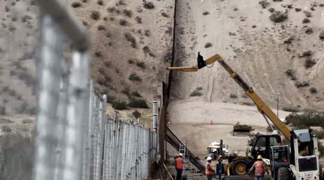 Threat of United States govt shutdown ebbs as Trump relents on wall funding