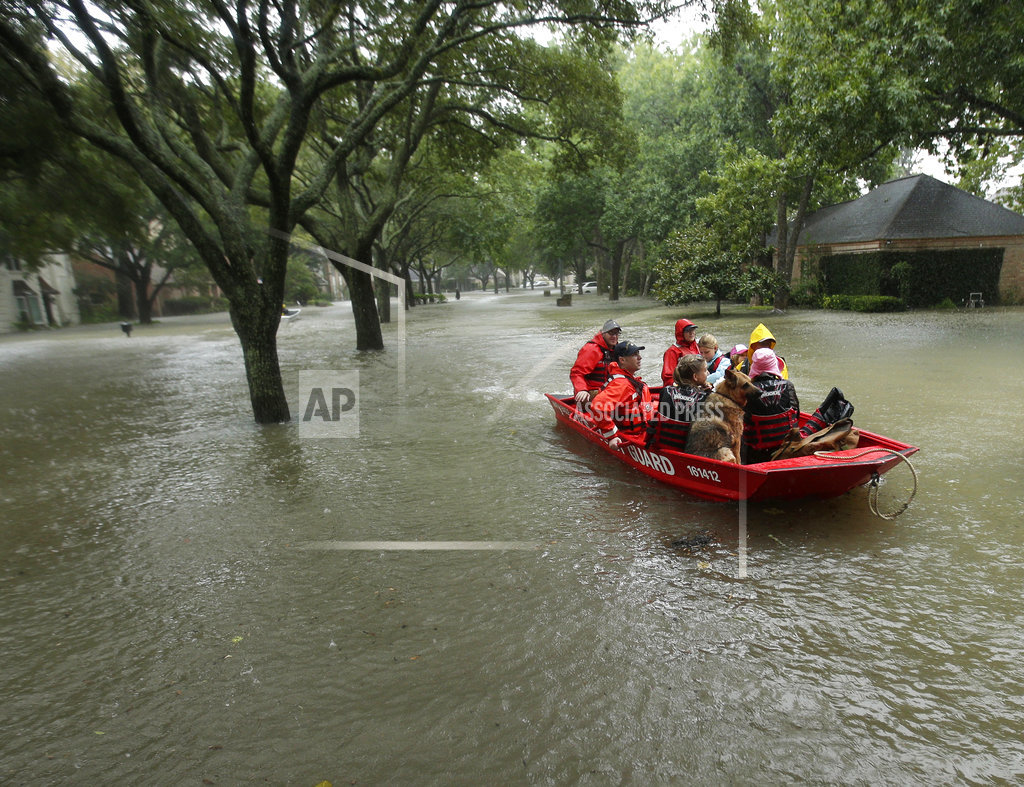 Feared Dead In Houston; Van Swept Away