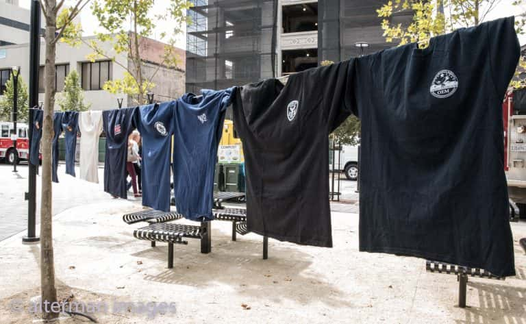 Just a small portion of the fire department t-shirts hung around the square.