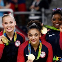 080916-sports-simone-biles-and-u-s-women-s-gymnastics-squad-win-olympic-gold