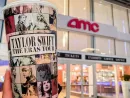 Taylor Swift The Eras Tour Film logo in front of AMC theaters