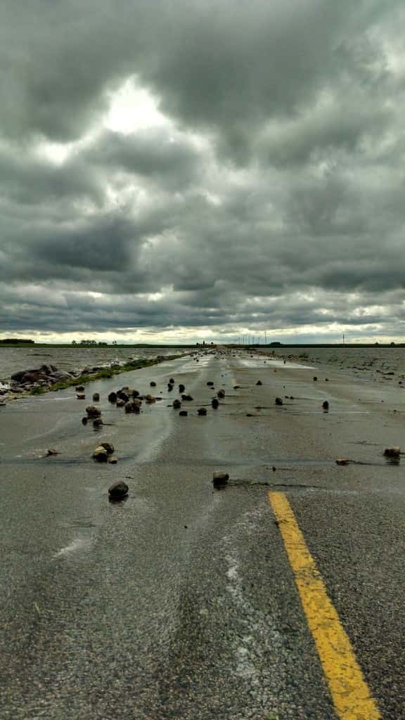 The June 28 photo shows how dangerous the road can be once the wind blows rocks on the road. Photo submitted by Kerry Johnson.