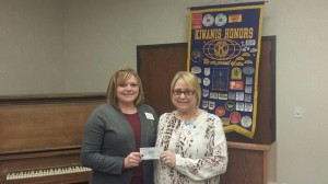 Hillery Mork of Sanford Children's Hospital in Fargo accepts a check from Jamestown Kiwanis President Jan Barnes on March 9th. (Photo courtesy of Kiwanis Facebook Page)