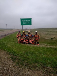 Members of the Oakes Fire Department depart from the McIntosh/Dickey County line on Saturday morning.
