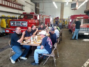 Members of the Ellendale fire department host the walkers from the Oakes Fire Department. Photos courtesy of Oakes Fire Department Facebook Page