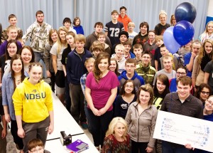 Joseph Vollmer, Grace City, earned a $1,000 scholarship from Northern Plains and Basin Electric Power Cooperative. Pictured is Joseph (far right corner) and his fellow students at Midkota Public School. Photo courtesy of NPEC