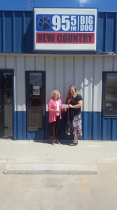 Peggy Etzold (Left) receives the $1,000 check from General Manager Tanea Clocksene (Right)