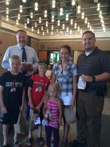 Police Chief Scott Edinger and Officer Andrew Staska pose with the kids. Photo courtesy of the Jamestown Police Department.