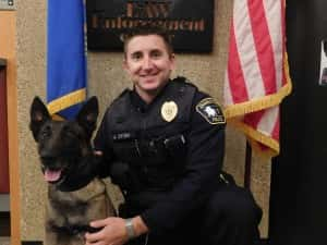 Officer Andrew Stoen and Odin. Photo courtesy of the Jamestown Police Department.