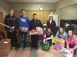 Pingree-Buchanan students pose with some of the gifts they purchased for the Angel Tree Program. Photo courtesy of the Jamestown Salvation Army.