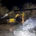 Wash Out: Contractor works to fill in the washed out rail bed northwest of Valley City.