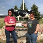 VanBedaf Dairy 3: Conny VanBedaf (left) gives check of all received donations to Anna Grenz (right) of Carrington Daily Bread. Photos; VanBedaf Dairy