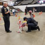 20190620_104829: Jamestown Police Officers helped a young girl fix her bike during the Kid Safety Day. Photo: Tami DIllman