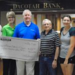 Dacotah Bank Donation.: L-R, Barnes County Museum Curator Wes Anderson, Dacotah Bank