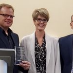 Dacotah Bank Award: L to R; Travis Christopher president of the American Fundraising Professionals Northern Plains Chapter, presented the 2019 Corporate Leadership in Philanthropy Award to Dacotah Bank’s Paige Bjornson and Mark Oberlander.