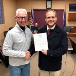 Proclamation.: L to R; Valley City Mayor Dave Carlsrud and St. Catherine's principal Josh Gow.