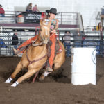 IMG_0177©www.CowboyImages.net: Jessica Routier places second in the second round at the 2020 Badlands Circuit Finals Rodeo, aboard her palomino mare Missy. Missy has won the WPRA Badlands Circuit barrel horse of the year award for the past four years, including this year. Photo by Cowboy Images/Peggy Gander.