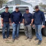 Farm Rescue: Volunteers; L to R Jeff Barnes, Chris Davison, Matt Blaylock and Chris Batdorf all of Quad Cities, Iowa.