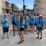 Young Women: Volunteers work on project in Valley City.