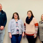 United Way Donation: L to R; Josh Johnson, Superintendent of Valley City Public Schools, Michelle Wobbema, President of United Way, Katie Youngbauer, Clinical Counselor with the Village, and Wendi Wilmes, Education Foundation Director for Valley City Public Schools.