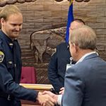 New Officer 2: Jamestown Mayor Dwaine Heinrich welcomes Officer Syris Jenson to the Jamestown Police Department