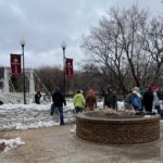 Sandbags: Volunteers place sandbags near VCSU foot bridge in Valley City.