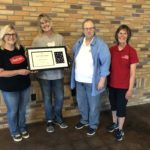 Recognition Certificate: L to R; Owners Teresa Perleberg and Chris Armbrust and Daughters of the American Revolution State Regency Sandy Sidler and Dacotah Chapter president Kristin McDonald.