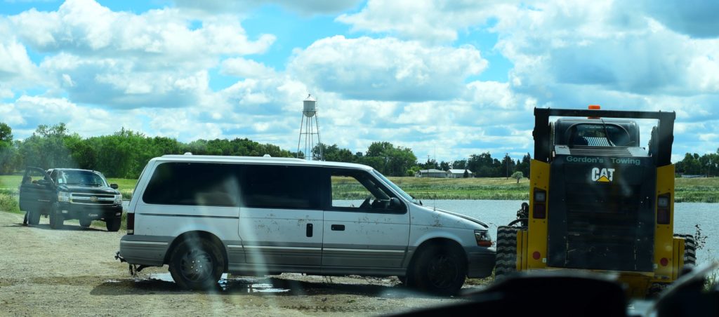 Vehicle Abandoned in Water West of Streeter - Vimarsana News