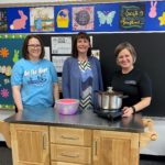 Mobile Food Cart: L to R; Emma Tufte, Kalyn Botz, and Sue Milender. The mobile food cart provides a workstation as well as cooking equipment for SVCTC students. Emma Tufte, On the Move Coordinator, Kalyn Botz, SVCTC Instructor and Sue Milender, NDSU Extension – Barnes County discuss ways the cart will support healthy eating in Barnes County.