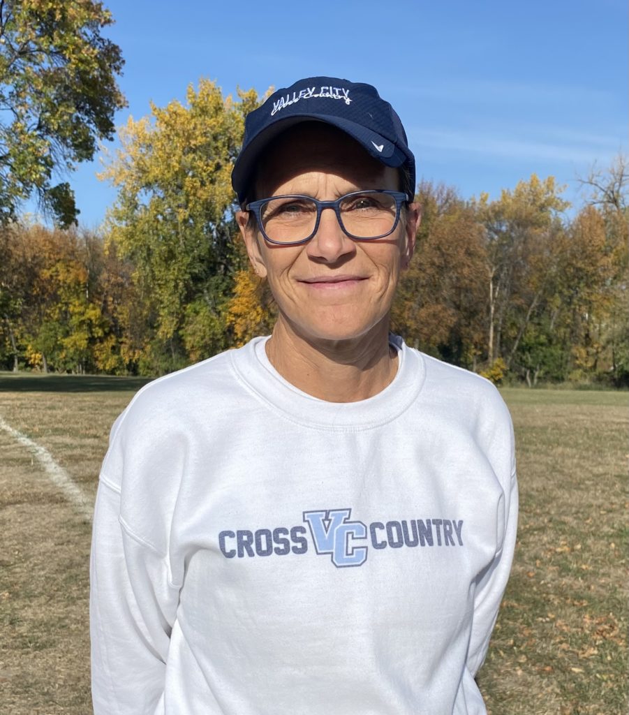 Beilke Wins Coach Honors at EDC Cross Country - Vimarsana News
