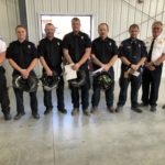 Volunteer firefighters recognized: L to R; Fire Chief Scott Magnuson, Chris Burk, Travis Hart, Garrett Suhr, Tyler Spurgeon the 4 received their FF1 and shields, next is Kendal Bjerke Auto Extrication Certification, Assistant Chief Lance Coit, and Lt. Jeff Schlittenhardt.