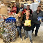 Newman-Signs-Food-Drive-2022-2