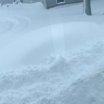 Car buried in snow.: Valley City, N.D.