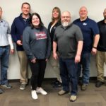 Rob Hunt receives his award.: Back row; Darren Anderson, Rob Hunt, Sherri Horsager, Ryan Mathias, and Rudy Ask. Front row; Abby Ingstad and Phil Hatcher.