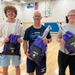 VCHS Students: PE Instructor Scott Roehrich with students on his side.