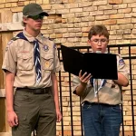 Flag Retirement: Kellen Westman looks on while John Oakland recites a Flag Day Poem.