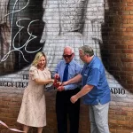 Mural: Holly Foster Wells, Myron Sommerfeld, and artist Bill Cochran.