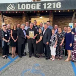 Jack Traynor Award: Front row: Sheila Nelson, Rhonda Newton, Traci Peterka, Randy Shook – Grand Exalted Ruler, Al Tews, Deb Eissinger, Michael Luhr – Past Grand Exalted Ruler, Ada DeBolt, Melanie Headland, Jo Biloff, Margaret Doyle Back row: Dave Nelson, Darin Kelstrom, Daren Peterka, Larry Doyle, Tyler Newton, Steve Davis, Clay Greenwood, Neal McCoy, Jody Schoeler, John Traynor III