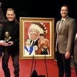 Virgil Hill: North Dakota Gov. Doug Burgum (from left), Rough Rider Award recipient Virgil Hill, Secretary of State Michael Howe and State Historical Society Executive Director Bill Peterson.