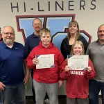 AMVET Essay and Drawing: L to R in red Jarett and Jaelyn Borg along with Valley City School Board members.