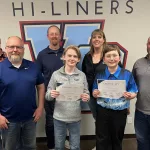 Geography Bee: L to R; Front and center Myles Elliott and John Oakland and the Valley City School board members.