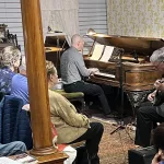 Museum Grand Piano: Dr. Ozzie Johnson plays the historic piano.