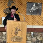 Medora: Buck Taylor from the television series Gunsmoke addresses honorees and members of the North Dakota Cowboy Hall of Fame.