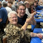 Oriska Reunion: Reporter Steve Urness enjoying a toast with Carrie Maresh (Class of 68) during the All-School Reunion for Oriska. Go Flickers!