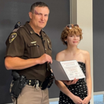 Saved by the Belt: NDHP Capt. Bryan Niewind and Gabriella Vickerman.