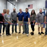 Ribbon Cutting Fun: Maple River School board.