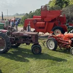 Tractor Trek: Check out the orange Case combine in the back row.