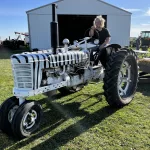 Plow Fest: Tyler Curtis on the Brudevold Zebra painted International H Tractor.