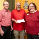 Unison Bank Donation: L to R; Unison Bank Chief Credit Officer Mark Domek, Salvation Army Social Services Assistant Chris Grindheim and Unison Bank SVP Operations, Audit & Compliance Kari Knecht.